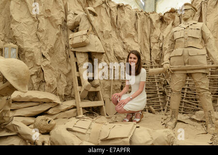 Sutton Coldfield student Grace Westwood with her life-sized depiction of World War One soldiers made entirely out of brown paper Stock Photo