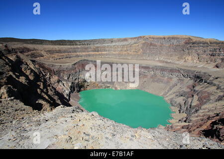 The blue-green lake in the crater of Santa Ana (Ilamatepec) volcano, El Salvador, bubbles slowly due to the geothermal heat. Stock Photo