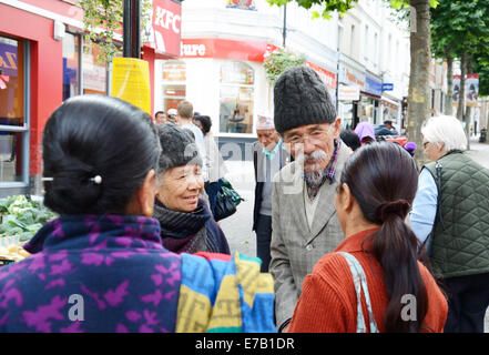 Gurkha people in conversation, in Aldershot, England Stock Photo