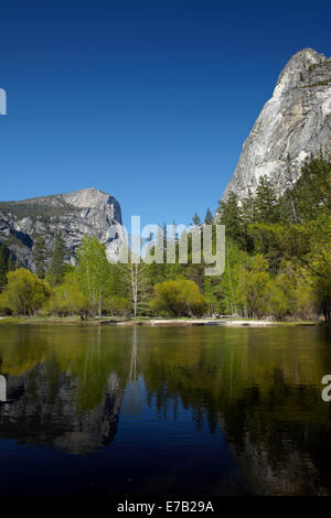 Mt Watkins and Half Dome (at right) reflected in Mirror Lake, Yosemite National Park, California, USA Stock Photo