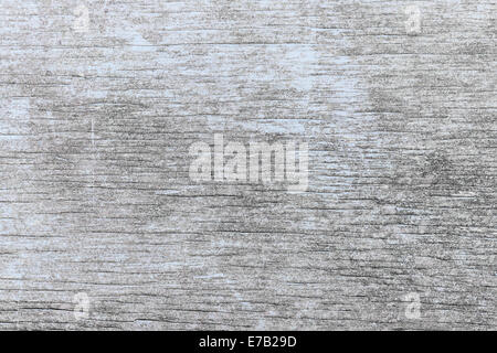 Old wooden background of weathered distressed rustic wood with faded light blue paint showing woodgrain texture Stock Photo