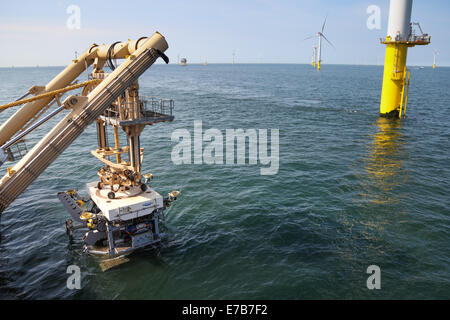 An SMD Remotely Operated Vehicle (ROV) cable trenching crawler working offshore on the Gwynt y Mor Offshore Wind Farm Stock Photo