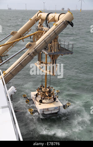 An SMD Remotely Operated Vehicle (ROV) cable trenching crawler working offshore on the Gwynt y Mor Offshore Wind Farm Stock Photo