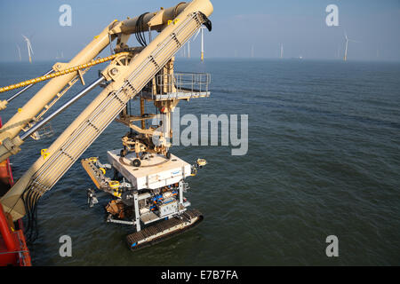 An SMD Remotely Operated Vehicle (ROV) cable trenching crawler working offshore on the Gwynt y Mor Offshore Wind Farm Stock Photo