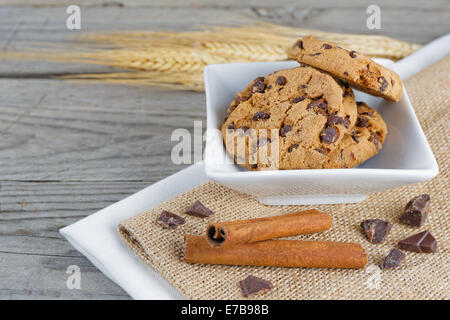 composition bowl of cookies on wooden table Stock Photo