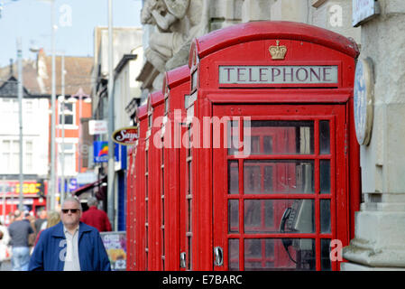 A row of old style BT telephone boxes Stock Photo