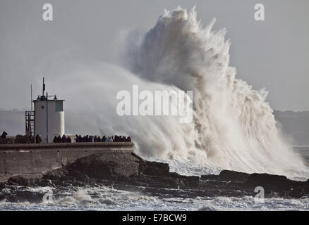 Gigantic waves hit the sea wall at Porthcawl in South Wales. Stock Photo