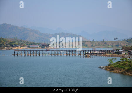 Saphan Mon - The 400m wooden bridge itself is well worth a visit and is the longest handmade wooden bridge in Sangkhlaburi Stock Photo