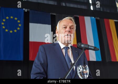 Former French Prime Minister Jean-Marc Ayrault speaks during the central of Rhineland-Palatine memorial on occassion of the 100th anniversary of the beginning of the First World War walk across the grounds of Ehrenbreitstein Fortress after a in Koblenz, Germany, 12 September 2014. Photo: Thomas Frey/dpa Stock Photo