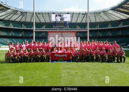 London, UK. 12th September 2014. Members of the 24th Irish Battery army regiment after breaking the Rugby World Cup 2015 largest scrum record at Twickenham during the tickets launch for the tournament. Credit: Elsie Kibue / Alamy Live News Stock Photo