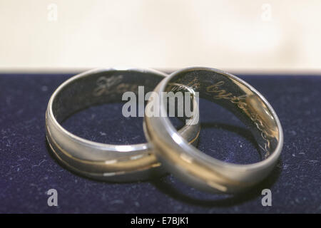Two golden weeding rings in closeup views. Stock Photo