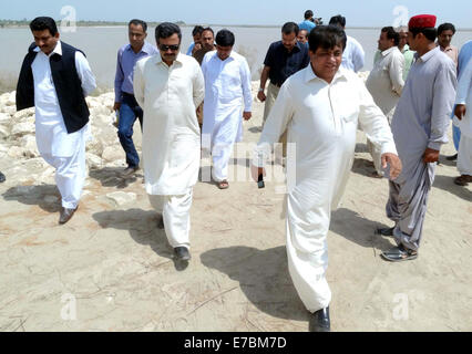 Director General Provincial Disaster Management Authority Commander Salman Shah is visiting Nusrat Loop Dam along with Commissioner Larkana Saeed Ahmed Magnejo in Naundero on Friday, September 12, 2014. Stock Photo