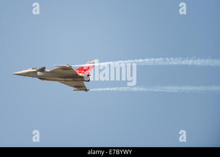 PAYERNE, SWITZERLAND - SEPTEMBER 6: Flight of Rafale jet fighter on AIR14 airshow in Payerne, Switzerland on September 6, 2014 Stock Photo