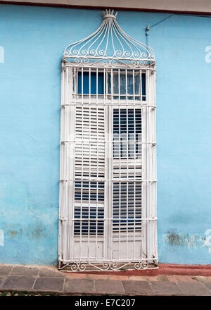 grilled window in facade of house, Trinidad, Cuba Stock Photo
