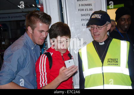 Kingswood, Bristol, UK. 13th Sep, 2014. Archbishop of Canterbury, Justin Welby, joins street pastors in Kingswood, Bristol, UK, September 12th 2014. Credit:  sophie merlo/Alamy Live News Stock Photo