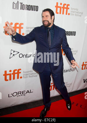 Toronto, Canada. 12th Sep, 2014. Actor John Travolta poses for photos before the world premiere of the film 'The Forger' at Roy Thompson Hall during the 39th Toronto International Film Festival in Toronto, Canada, Sept. 12, 2014. Credit:  Zou Zheng/Xinhua/Alamy Live News Stock Photo