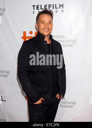 Toronto, Canada. 12th Sep, 2014. Actor Travis Wade poses for photos before the premiere of the film 'The Forger' at Roy Thompson Hall during the 39th Toronto International Film Festival in Toronto, Canada, Sept. 12, 2014. Credit:  Zou Zheng/Xinhua/Alamy Live News Stock Photo