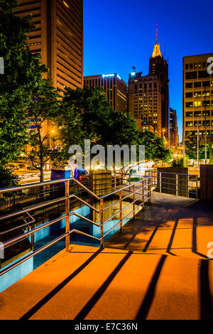 Elevated walkway and buildings at night in Baltimore, Maryland. Stock Photo
