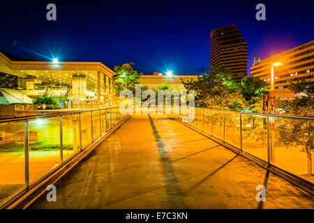Elevated walkway and the Convention Center at night in Baltimore, Maryland. Stock Photo