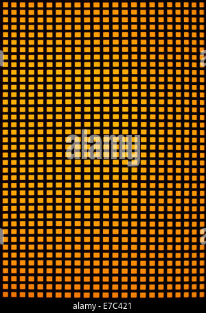 Black hole grid with yellow backlight Stock Photo
