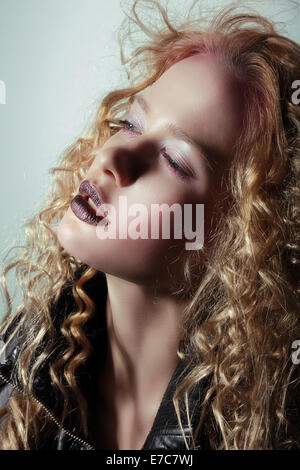 Glam. Profile of Pensive Girl with Trendy Vivid Makeup Stock Photo