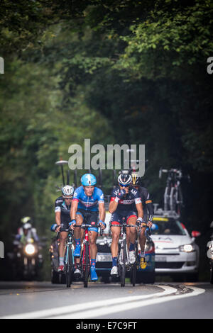 Fernhurst, UK. 13th Sep, 2014. Kevin Ista of IAM Cycling chats with Dylan Van Baarle of Garmin Sharp in the early breakaway group on Stage 7 (Camberley to Brighton) of the 2014 Tour of Britain. Credit:  Anthony Hatley/Alamy Live News Stock Photo