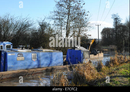 Dredging on the Stratford upon Avon canal near Wooton Wawem in Warwickshire, England, UK Stock Photo
