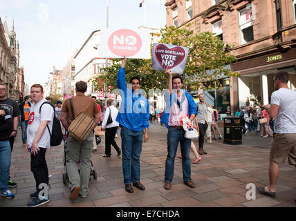 Glasgow, Scotland, UK. 13th September, 2014. Two male no supporters hold banners during the lead up to the Scottish independence referendum on Buchanan Street, Glasgow, Scotland on Saturday 13th September 2014 Credit:  Iona Shepherd/Alamy Live News Stock Photo