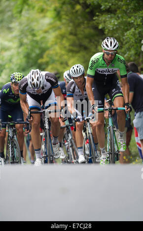 Ditchling Hill, East Sussex, UK. 13th September, 2014. Group of cyclists competing in Tour of Britain 2014 during Stage Seven (Camberley to Brighton) taken on Ditchling Hill, East Sussex. Credit:  Christopher Mills/Alamy Live News Stock Photo