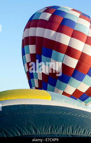 Two hot air balloons being inflated for flight Stock Photo