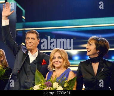 Freiburg, Germany. 1st Sep, 2014. () - German singer Udo Juergens (L-R) and the singers Annett Louisan and Paola Felix stand on stage during the televised Jubilee event titled 'Udo Juergens ? Mitten im Leben' (Udo Juergens ? In the middle of life) on German public broadcaster ZDF in Freiburg, Germany, 1 September 2014. Juergens is celebrating his 80th birthday on 30 September 2014. Photo: Patrick Seeger/dpa/Alamy Live News Stock Photo