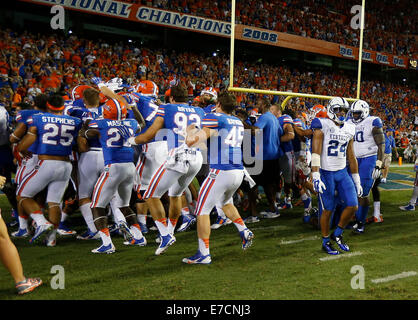 Sept. 13, 2014 - Gainesville, FL, USA - The UK defense walks off as Florida celebrates after defeating the University of Kentucky in triple overtime in Ben Hill Griffin Stadium in Gainesville, Fl., Saturday, September 13, 2014. This is overtime action. Florida won 36-30 in 3 overtimes. Photo by Charles Bertram | Staff. (Credit Image: © Lexington Herald-Leader/ZUMA Wire) Stock Photo