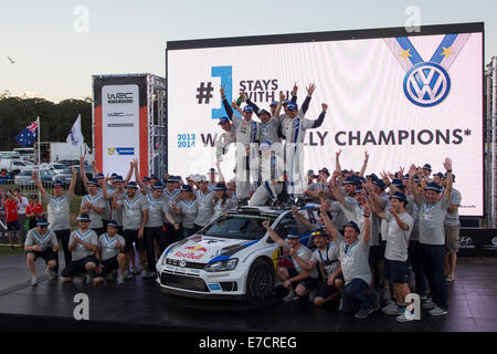 Coffs Harbour, Australia, Sunday, 14 September, 2014. Volkswagen Motorsports World Rally Team celebrate securing the 2014 FIA World Rally Manufacturer's Championship in Australia. Volkswagen was able to secure the championship with a first, second and third driver's placing for Rally Australia. Credit:  Russell Hunter/Alamy Live News Stock Photo