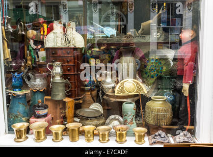 Ashburton, Devon. The shop window of an Antiques and Curios shop in Ashburton, Devon, England. Stock Photo