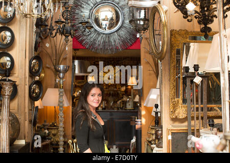 https://l450v.alamy.com/450v/e7d0ty/beautiful-mixed-race-woman-shopping-in-pariss-amazing-antiques-market-e7d0ty.jpg