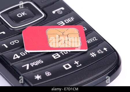 SIM Card over the Phone isolated on white background Stock Photo