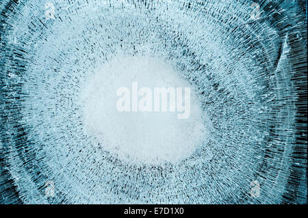 Circular and radial patterns formed in frozen water. Stock Photo