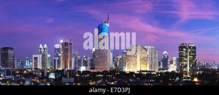 Panoramic cityscape scenic view of Indonesia capital city Jakarta at sunset Stock Photo