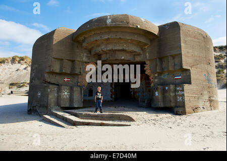 Boy playing in a German WW2 bunker Stock Photo