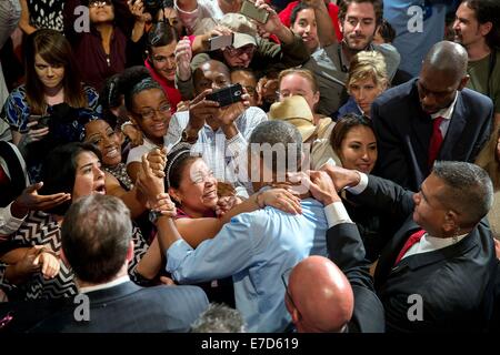 US President Barack Obama greets audience members after he delivers remarks on the economy at the Paramount Theatre July 10, 2014 in Austin, Texas Stock Photo