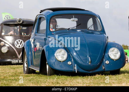 1060's Volkswagen Beetle with camper van Stock Photo