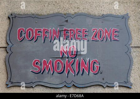 sign for a house of horrors ride 'Coffin free zone No Smoking' Stock Photo