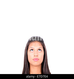 Portrait of young girl with her eyes looking up isolated on white background Stock Photo