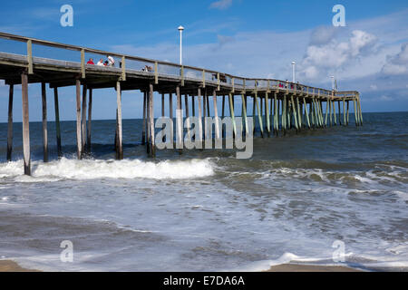 Pier jutting out into Atlantic Ocean at Ocean City, Maryland Stock Photo