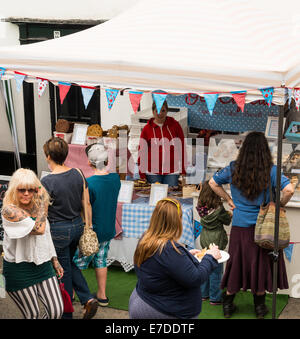 The Ashburton Food & Drink Festival. The Get Cupcaked stall selling cakes and giant gingerbread men. Stock Photo