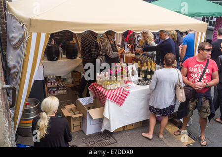 Ashburton Food & Drink Festival market stalls UK. The Ashridge Cider stall selling organic cider and soft drinks. Stock Photo