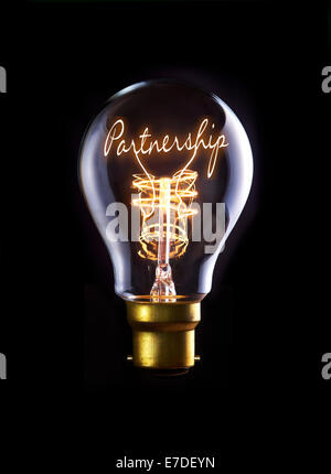 Partnership concept in a filament lightbulb. Stock Photo