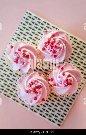 Four creamy cupcakes