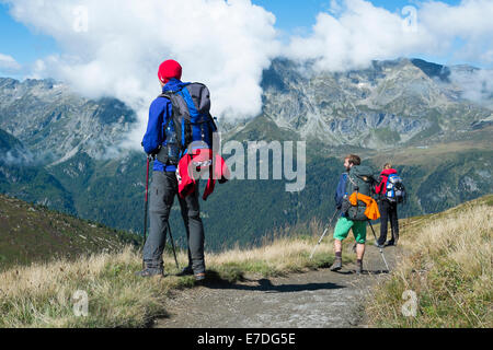 COL DE BALME, FRANCE - SEPTEMBER 01: Backpackers looking at view with Aiguille de Loriaz in the background. The area is a stage Stock Photo
