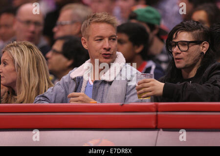 Celebrities out at the Los Angeles Clippers game who defeated the Phoenix Suns by the final score of 112-105 at Staples Center  Featuring: Diplo,Skrillex Where: Los Angeles, California, United States When: 10 Mar 2014 Stock Photo
